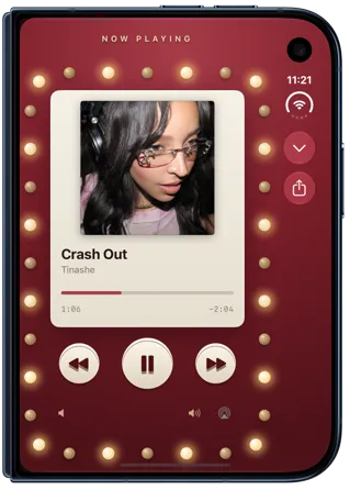 Marquee player style on the iPhone Duo outer display, with golden bulbs around the album art and the close and share buttons in the side bar